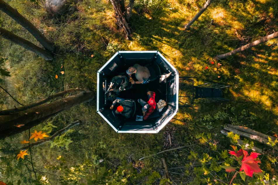 4 men inside a blind from the top